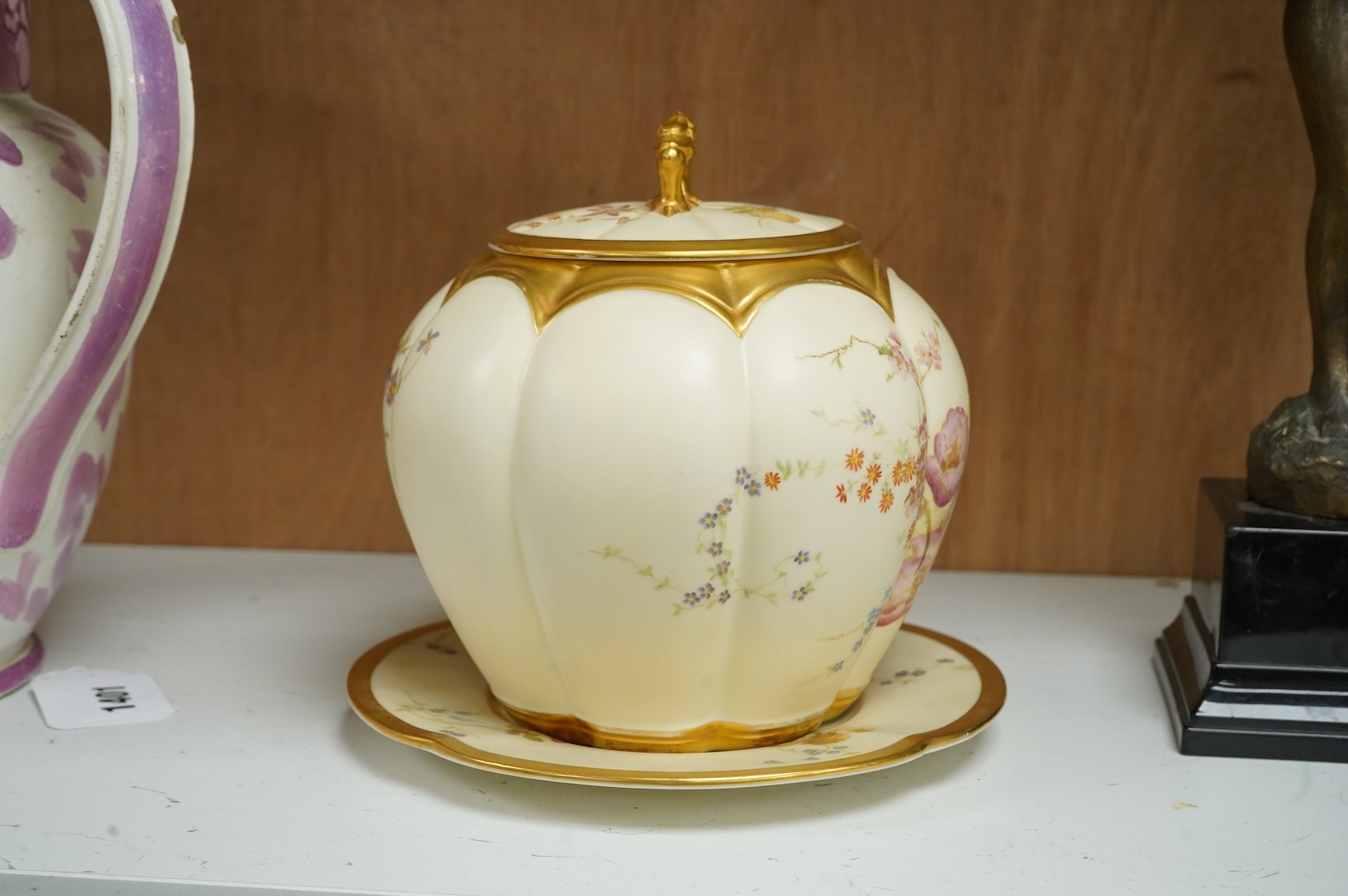 A Worcester floral biscuit barrel on stand, numbered 1412 to the base, 18cm high